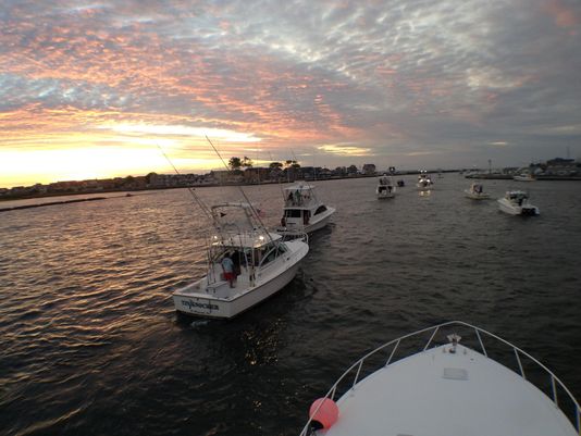 Boats head out of Manasquan Inlet last year for a day of fishing. Photo: John Oswald/For the Asbury Park Press