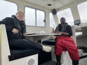 Teemer Barry inside a boat.